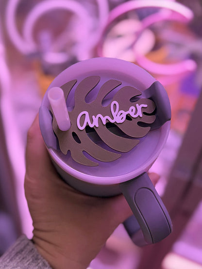 Personalized Monstera leaf straw topper on a Stanley 40oz tumbler, custom name straw cover for plant lovers