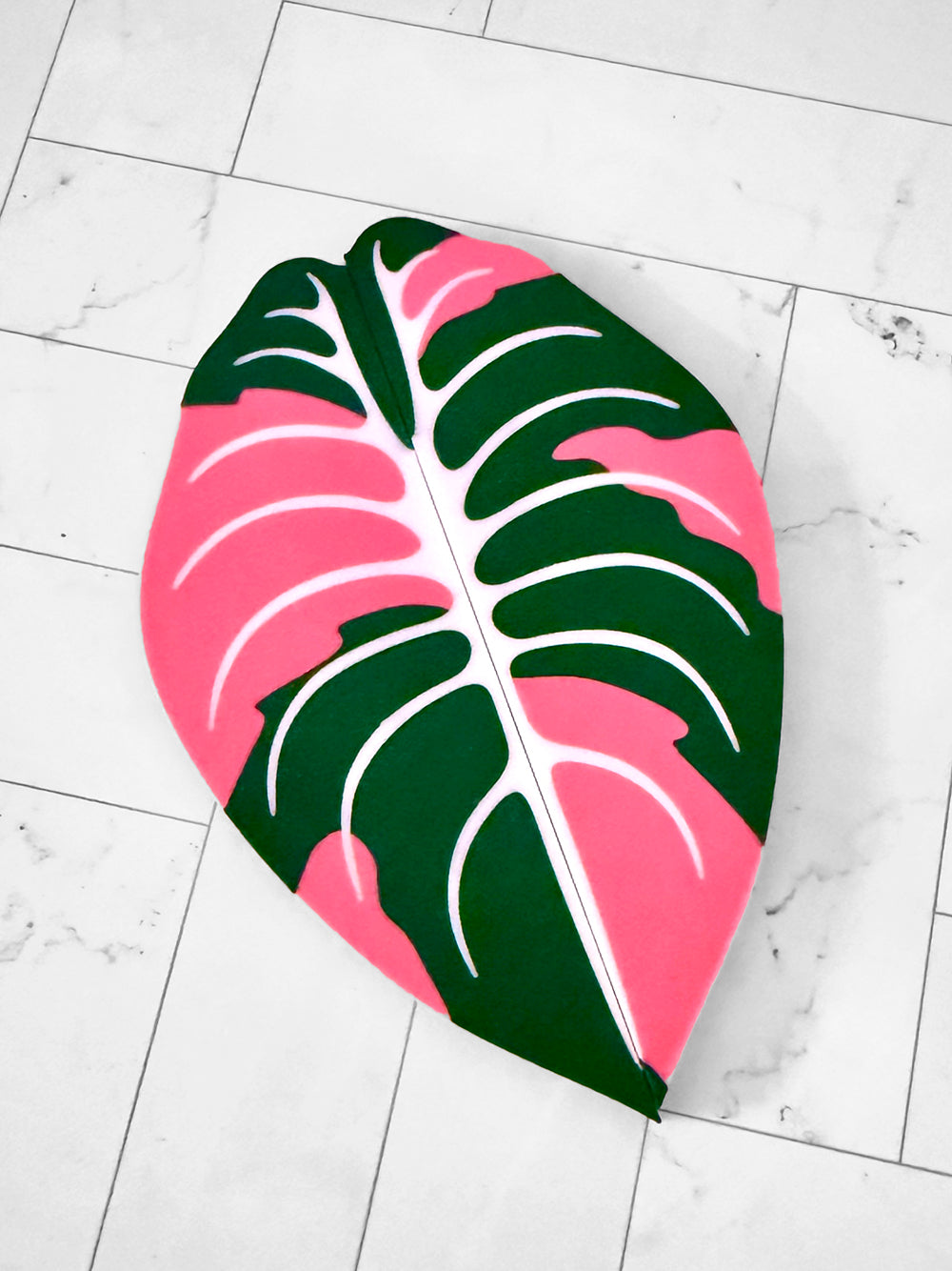 Slip-on Alocasia cabinet handle cover designed for IKEA greenhouse cabinet handles.