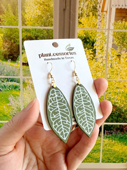 3D printed Hoya finlaysonii leaf earrings with white veining on green leaf design.