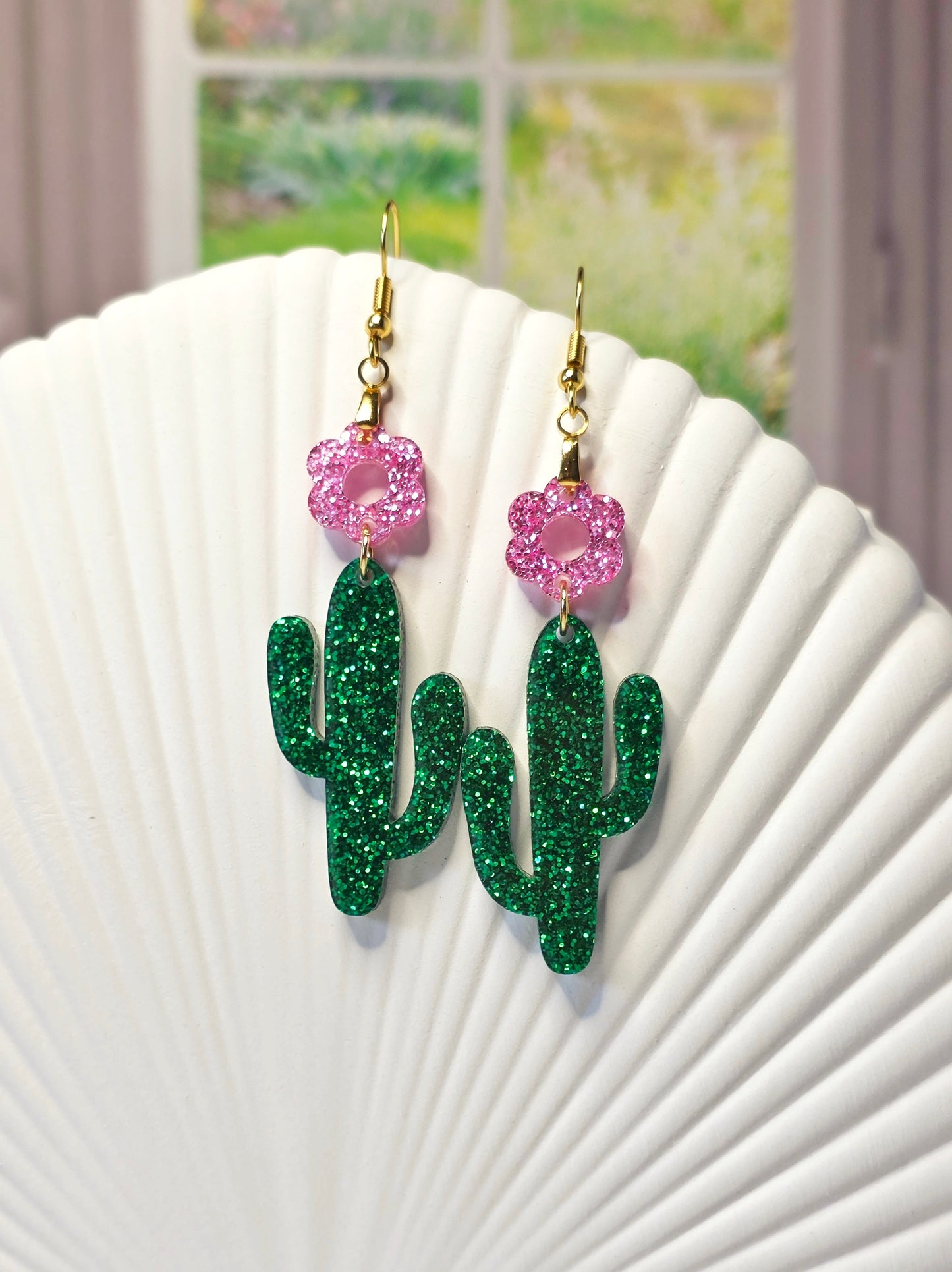 Glittery Cactus-shaped earrings with pink flowers on top