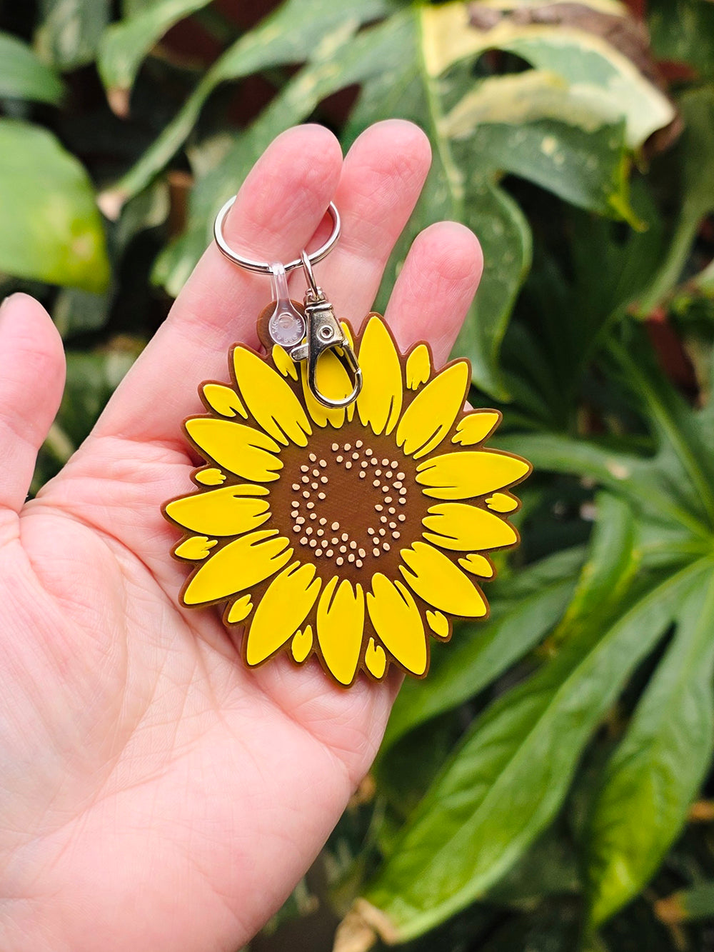 Sunflower keychain and bag charm 3D printed from plant-based PLA.