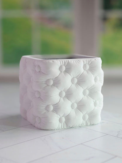 Tufted cube planter with a soft button-tufted texture and modern square shape, designed to fit a 2 inch square nursery pot