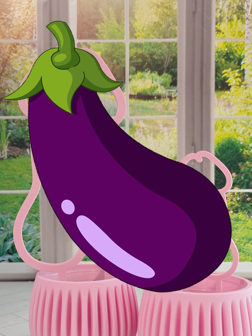 Censored Pink decorative Rise and Shine plant trellis in a ribbed pink planter near a bright window